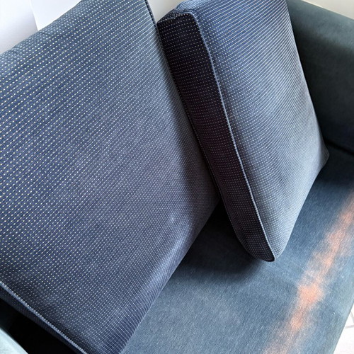 Two dark blue used two-seater sofas set