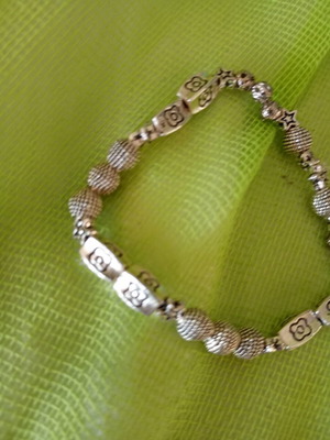 Grey bracelet with assorted beads