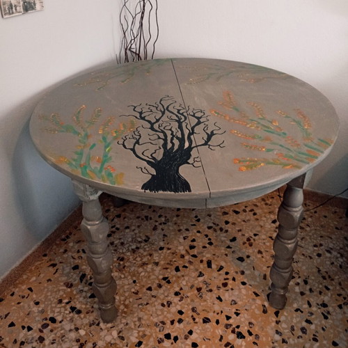 Round table with painted design, chalk paint