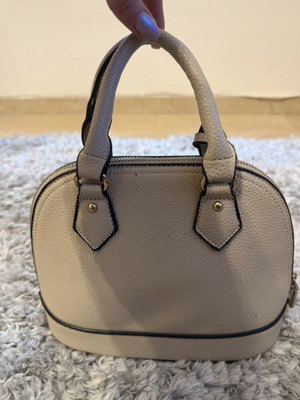 Beige handheld bag like new, classic minimal style