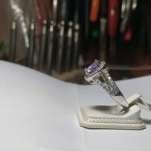 Silver (925) ring new with purple stone and smaller stones