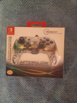 Nintendo Switch console with controller, Mario Kart Deluxe 8 code