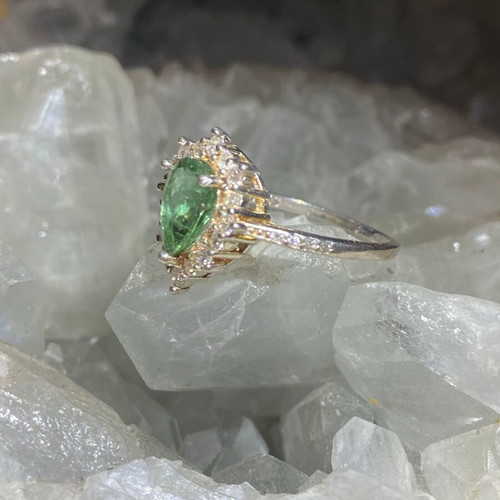 Silver ring with natural green tourmaline and moissanite