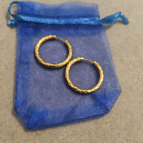 Steel earrings in gold color like new