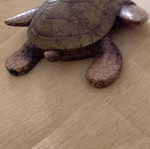 Turtle decorative item used, broken leg