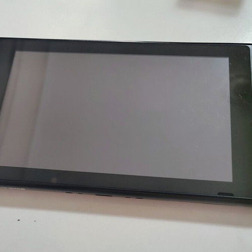 Nintendo Switch console with accessories and carrying case