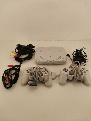Sony PlayStation PS1 console used with controllers and cables