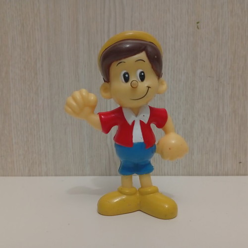 Pinocchio figure with nose mechanism, used
