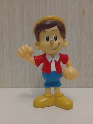 Pinocchio figure with nose mechanism, used