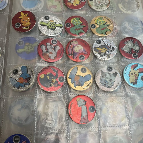 Pokemon tazos with album collection