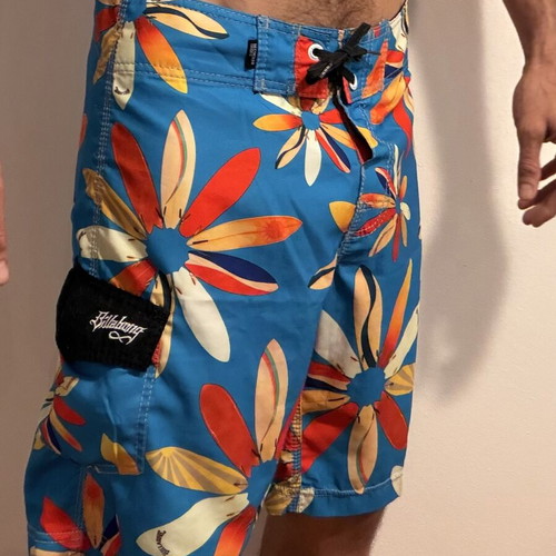 Billabong swim shorts used, size 31, floral pattern, turquoise