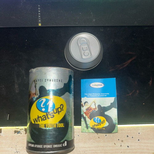 What's Up (Cosmote) collectible metal tin used with leaflet