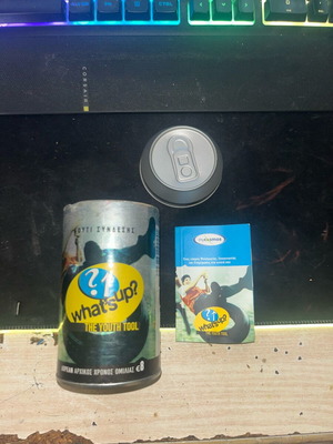 What's Up (Cosmote) collectible metal tin used with leaflet