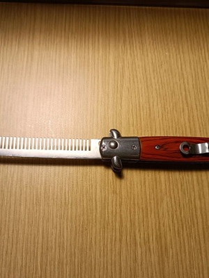 Stiletto comb knife iron with wooden handle like new