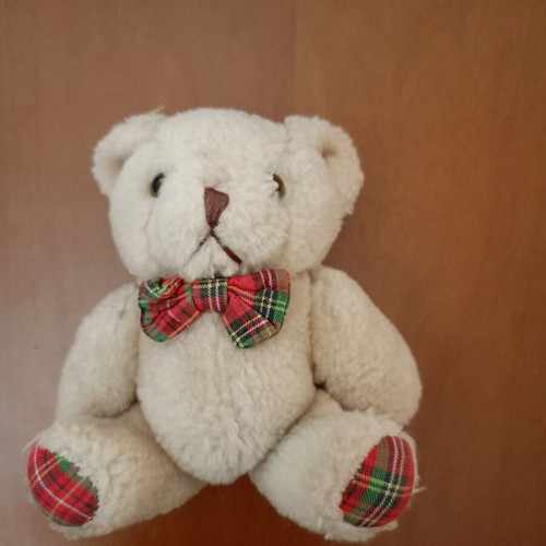 Plush teddy bear with plaid bow tie like new