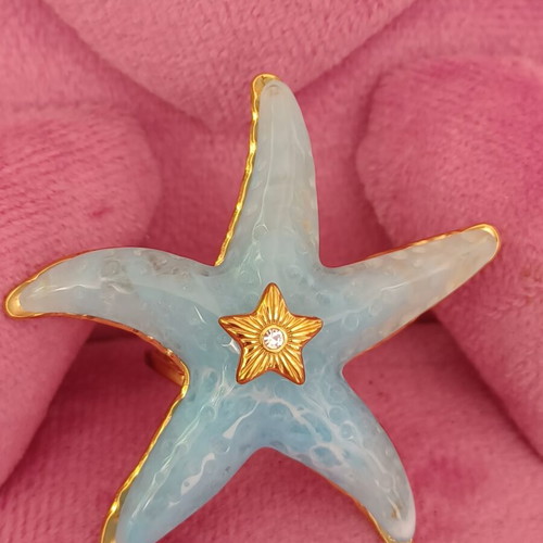 Starfish ring like new with blue marble effect and gold details