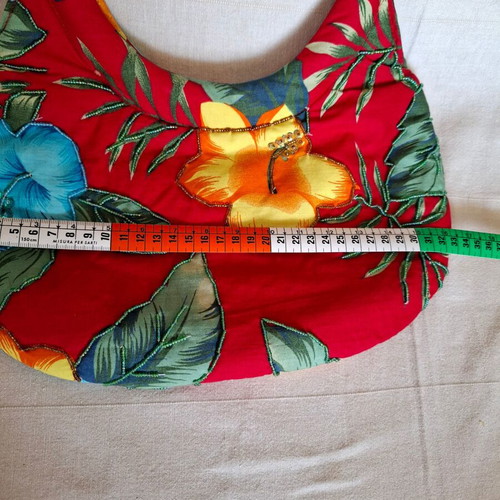Handbag like new with wooden handle and colorful floral design