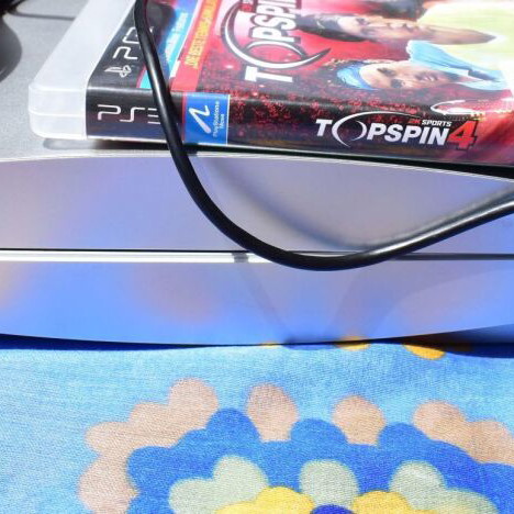 PlayStation 3 Slim 320GB Satin Silver console used with cables and controller