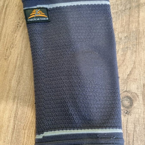 Medical Brace elbow support like new, elastic for epicondylitis in grey