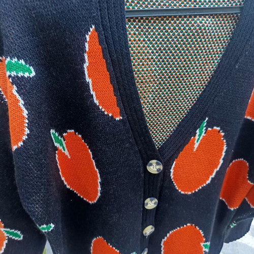 Knitted winter cardigan with buttons one size new, black with orange fruit design