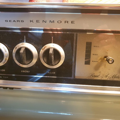 Vintage 1970s home appliance set used, General Electric fridge, Kenmore stove, Ariston washer