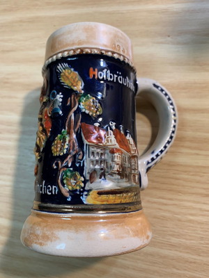 German mug with embossed design in almost like new condition