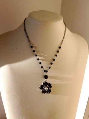 Necklace new with black flower and silver chains