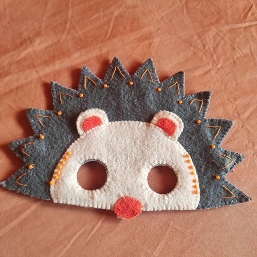 Handmade hedgehog mask used, felt with beads