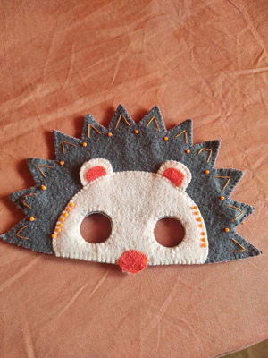 Handmade hedgehog mask used, felt with beads