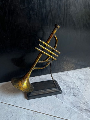 Vintage brass decorative musical instrument with black base, 30 cm