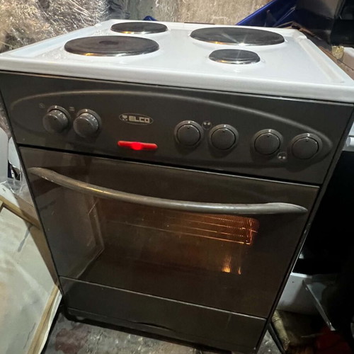 Kitchen stove with enamel hotplates used, fully functional
