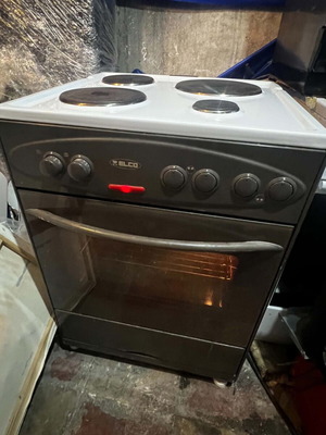 Kitchen stove with enamel hotplates used, fully functional