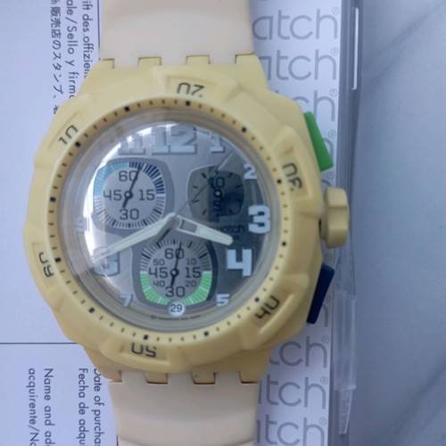 Swatch unisex watch with new yellow silicone strap, like new