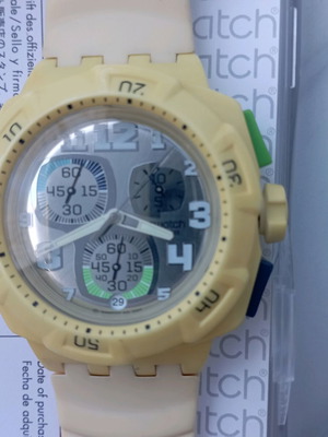 Swatch unisex watch with new yellow silicone strap, like new