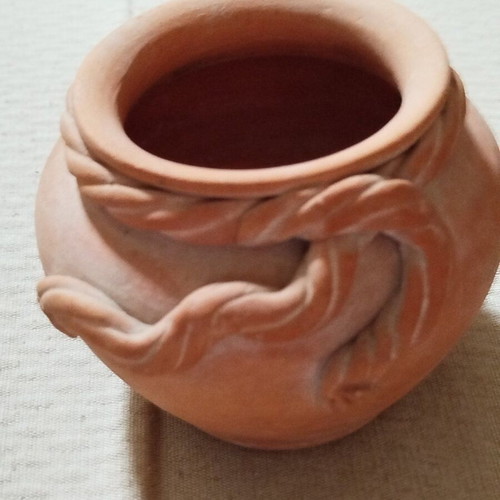 Decorative terracotta vase used, unpainted, folk art