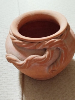 Decorative terracotta vase used, unpainted, folk art