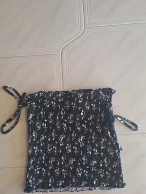 Pink Woman black smocked top with floral print size S like new
