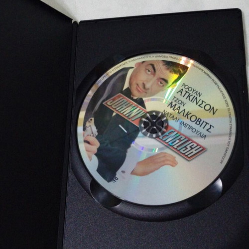 Johnny English DVD like new, comedy action adventure with subtitles