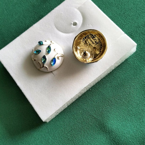 Stud earrings new with white, blue and mint leaves