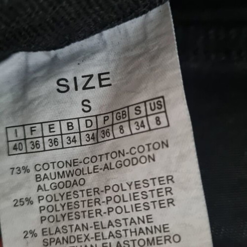 Jean with crooked button fastening black size small, new with tags