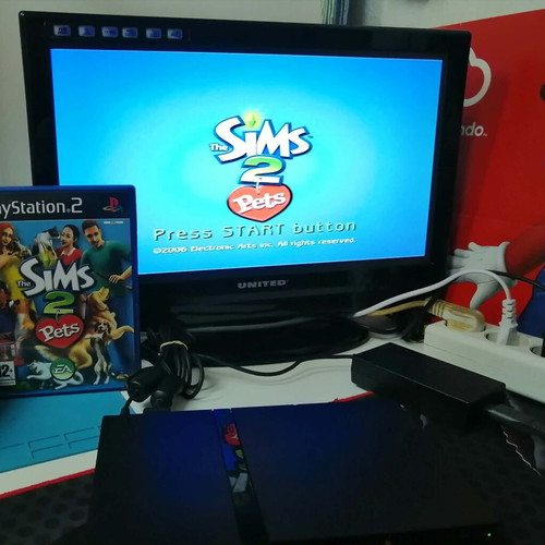 The Sims 2 Pets PS2 game, English, complete with manual