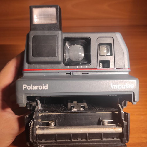 Polaroid Impulse camera used, not working, for parts