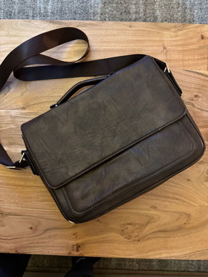 Brown shoulder bag used with multiple pockets