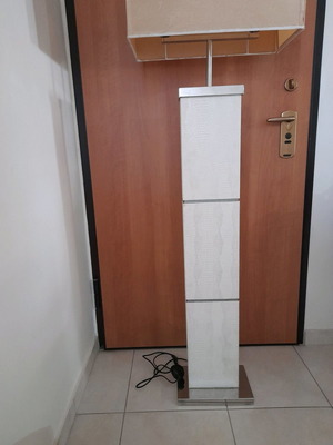 Floor lamp used, 1.65 m height, silver base, white leatherette