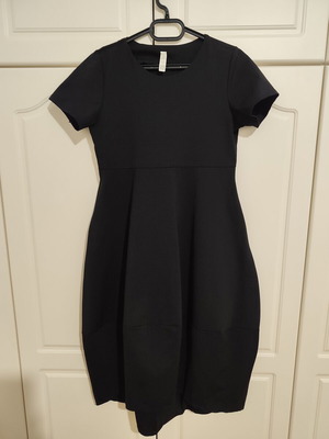 Black midi dress one size, slightly balloon, asymmetrical design