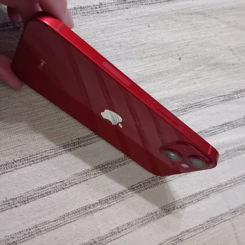 iPhone 13 used, red, with charger and cases