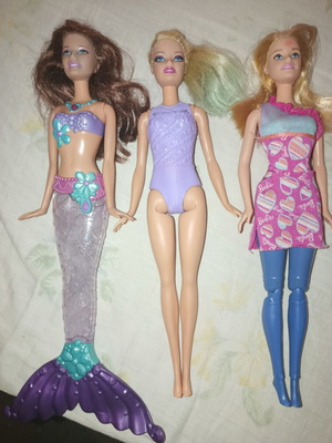 Barbie dolls used, set of 4