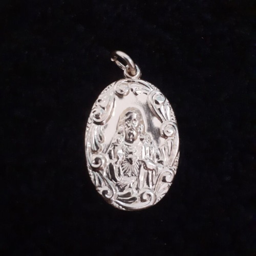 Christian pendant from the 70s, new, gold-colored metal