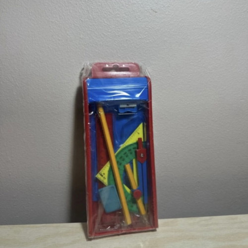 Geometric instrument set new with compass, ruler, pencil, eraser, sharpener