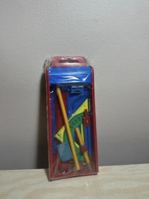 Geometric instrument set new with compass, ruler, pencil, eraser, sharpener